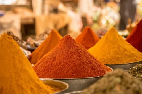 close up of powdered spices on market stall