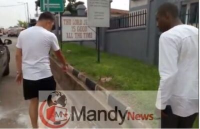 Ghanaian Journalist Orders Chinese Man To Pick Rubbish In A Gutter (Video)