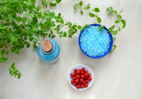 20 Powerful Herbs for Financial Prosperity: How to Use Herbs to Attract Money 11 salt and berries on the wooden surface