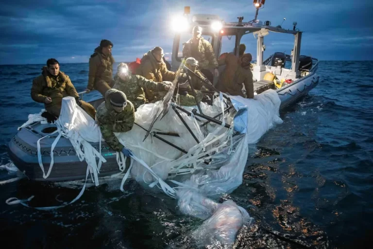 Sailors from Explosive Ordnance Disposal Group 2 recover wreckage from the mysterious Chinese balloon that was shot down by the United States off the coast of Myrtle Beach, South Carolina. Fleet Forces/U.S. Navy via Reuters