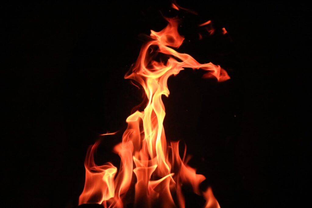 selective focus photography of fire