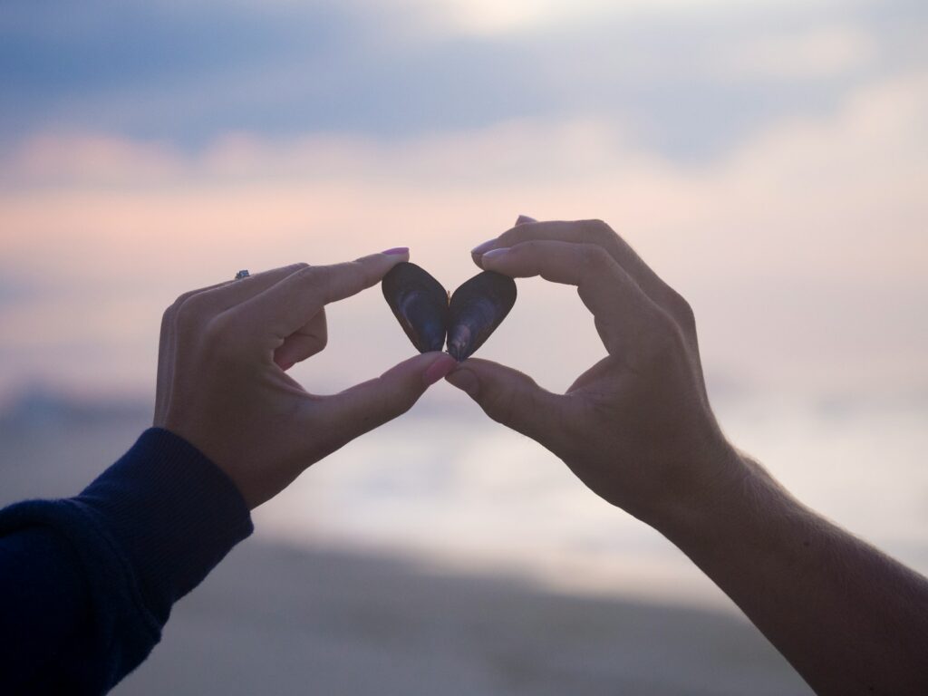 200+ Questions To Ask Your Boyfriend On Valentine's Day 10 person holding black stones