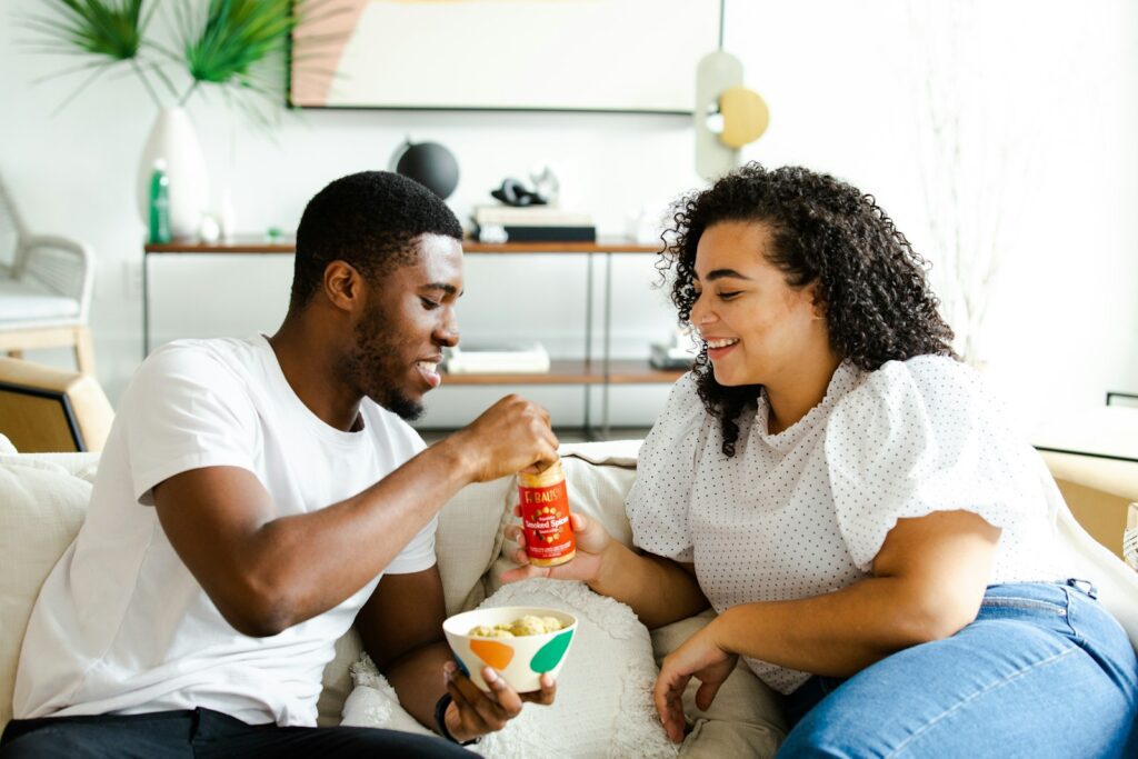 200+ Questions To Ask Your Boyfriend On Valentine's Day 9 man in white crew neck t-shirt and blue denim jeans sitting on white sofa chair